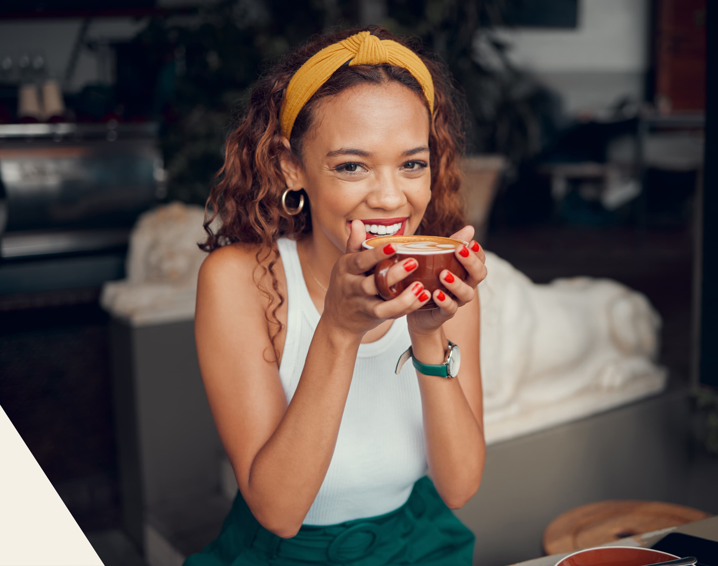 Laughing Woman holding mug of coffee