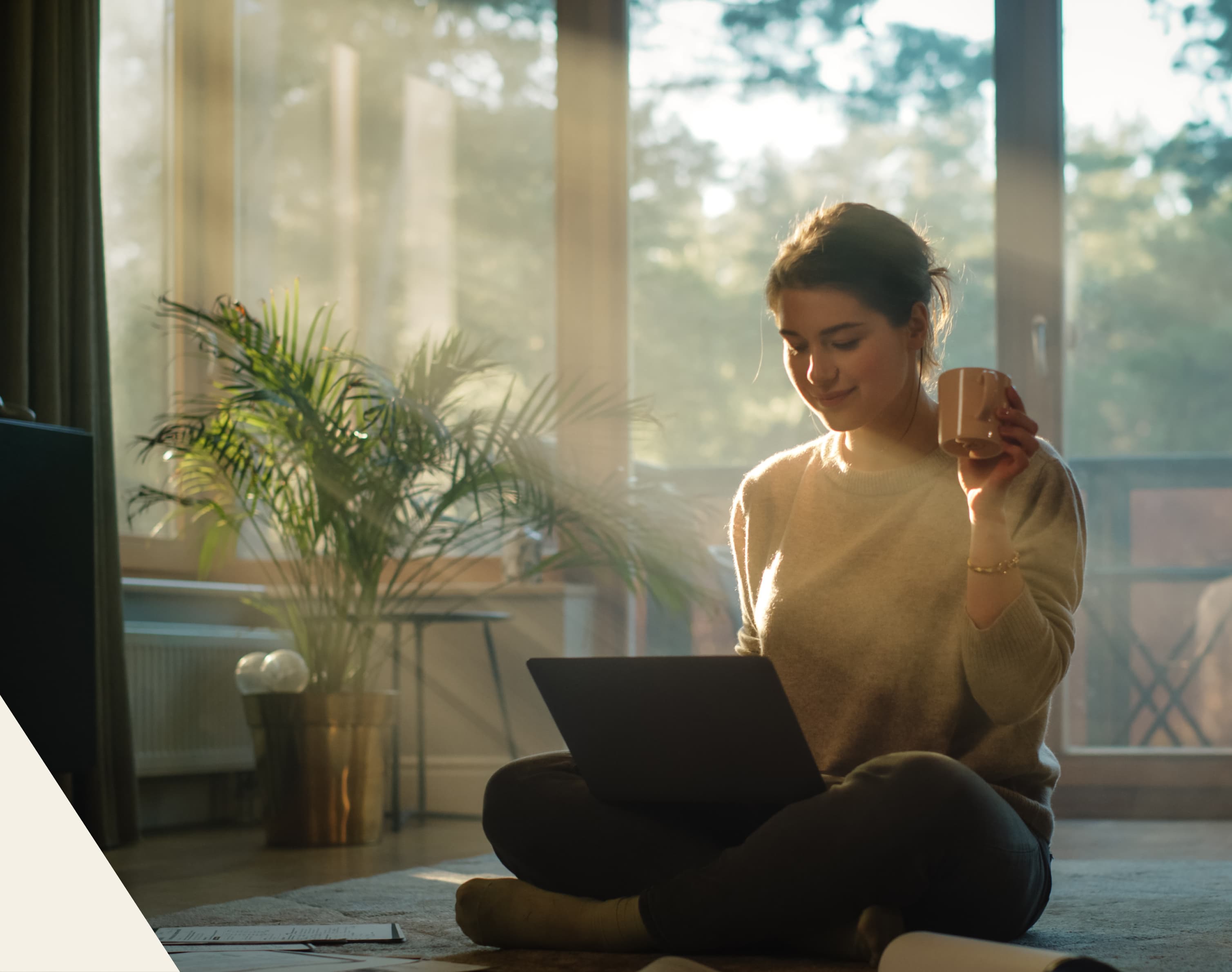 Laughing Woman holding mug of coffee